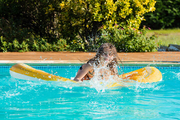 Sticker - cute little girl playing in the pool