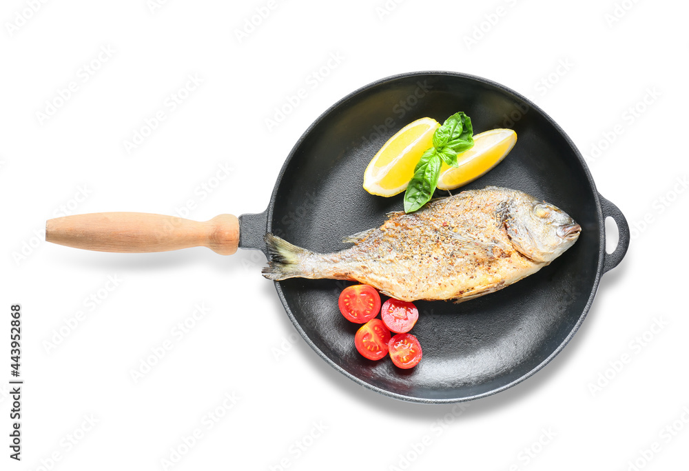 Frying pan with dorado on white background