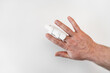 © Maria - orthosis for fixing the finger on hand on a white background