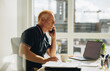 © Jacob Lund - Senior businessman talking on phone