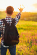 © Shopping King Louie - Back view, Human hand, tourist covering sunlight, Sun shining through hand, Human hand and sun, travel concept