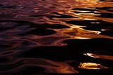 Fototapeta Morze - macro texture of the water surface, smooth sea waves. colored water