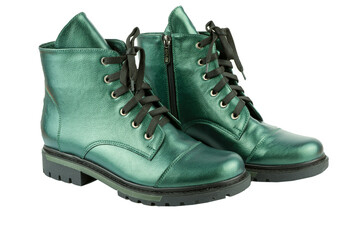 Green leather shoesisolated on white background. Winter and spring off-season boots. Stylish boot. Close-up. Laces, tractor sole. Casual style. Copy space. Pearlescent fashionable color.