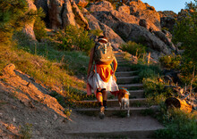 Young Woman Hiking Through Horsetooth Rock During Golden Hour
