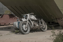 An Old Abandoned Motorcycle With A Sidecar. Abandoned Motor Vehicles. Sunny Day.