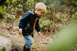 © Melissa Milis Photography/Stocksy - Boy having fun in the forest