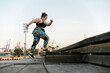 © Ezequiel Giménez/Stocksy - Curvy active woman running down the stairs