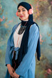 © Studio Marmellata/Stocksy - Content Arab woman enjoying songs in headphones