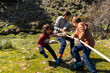 © Manu Prats/Stocksy - Little kids playing with a rope outdoor
