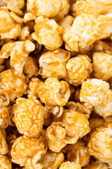 caramel popcorn texture background. Sweet caramel popcorn close-up