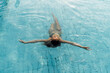© Mattia/Stocksy - Woman Relaxing on a Swimming Pool