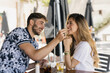 © Javier Pardina/Stocksy - couple making vermouth in the bar