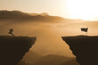 © MedRocky - Man Running On Mountain Cliff To Jump To other Side In Order to Achieve His Goal. Panoramic Mountain Scene . Achieve Goal and success  concept Idea.  Panoramic Scenery