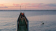 Sunset at Long Point Jetty with people fishing and swimming, Port Kennedy