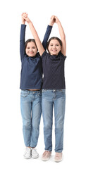 Poster - Cute twin girls on white background