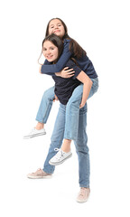 Poster - Cute twin girls on white background