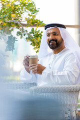 Middle Eastern Arab Emirati man at the Cafe in Dubai, United Arab Emirates