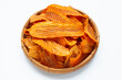 Spicy snack, Banana slice chips paprika flavor in bamboo basket on white background.