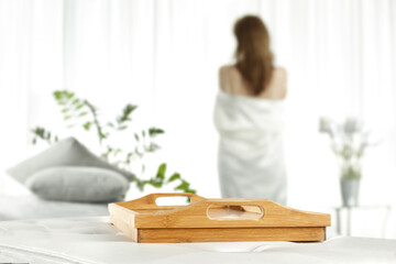 Wall Mural - Brown wooden tray of free space for your deocration and slim young woman with window 