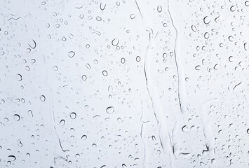 White rain drops on the glass car for texture and background