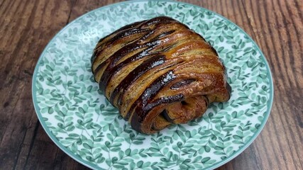 Wall Mural - Pain au chocolat ou chocolatine sur une assiette