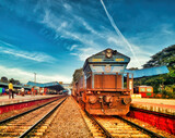 Indian railways train halted at a station near Mysore.