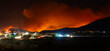 Beckwourth Complex Fire Burns North of Reno Nevada behind Bordertown at Night with Shallow Depth of Field