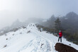 © cicerocastro - Tourists hiking in Pico Ruivo footpath covered with snow in Santana, Madeira island