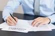 © bennnn - Business man signing document. Business man signing contract. Close up of business manager signing document on table.