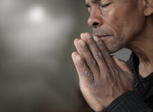 Man Praying To God With Hands Together Caribbean Man Praying Stock Photo