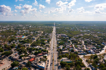 Wall Mural - Aerial view of the Tulum town from above. Small Mexican village near Cancun.