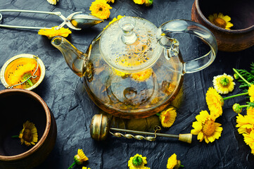 Wall Mural - Teapot with fresh flower tea,herbal medicine