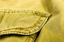 Clothing Items Stonewashed Cotton Fabric Texture With Seams, Clasps, Buttons And Rivets, Macro