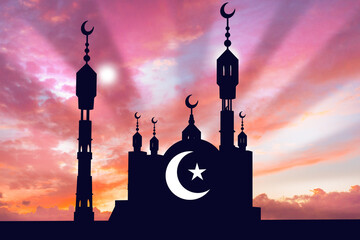 Wall Mural - The silhouette of the mosque against the evening sky. Mosque, star and crescent at sunset. The Muslim religion. Signs of Islam. Symbols of the Muslim faith. A place to pray to Allah.