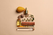 Bottle Of Luxury Perfume And Different Ingredients On Beige Background, Flat Lay