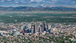 Aerial view of Denver Colorado with Rocky mountain backdrop