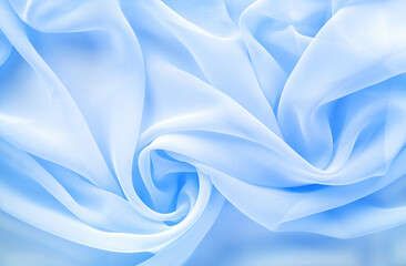 Wall Mural - light blue transparent fabric draped with large folds