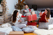 © ako-photography - young girls having fun wrapping gifts at home, great teamwork of friends packing presents for christmas