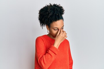 Poster - Young african american girl wearing casual clothes tired rubbing nose and eyes feeling fatigue and headache. stress and frustration concept.