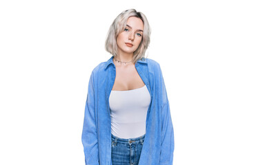 Sticker - Young blonde girl wearing casual clothes relaxed with serious expression on face. simple and natural looking at the camera.