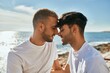 © Krakenimages.com - Romantic gay couple at the beach.