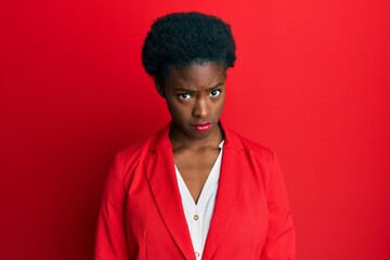 Poster - Young african american girl wearing business clothes skeptic and nervous, frowning upset because of problem. negative person.