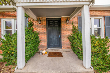 Front door exterior with minimalist halloween decoration