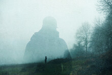 A Double Exposure Of An Atmospheric Half Transparent Man Looking At A Person Standing On The Edge Of A Forest In The Countryside. On A Moody Foggy Winters Day.