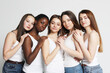 © Raisa Kanareva - International group of young smiling girls together, youth. Various apperances and races.