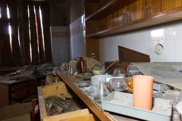 abandoned laboratory room with shelving