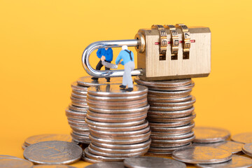 Wall Mural - Two lumberjacks sawing the code lock on the coin