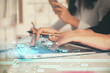 © peshkova - Multi exposure of woman hands working on computer and data theme hologram drawing. Tech concept.