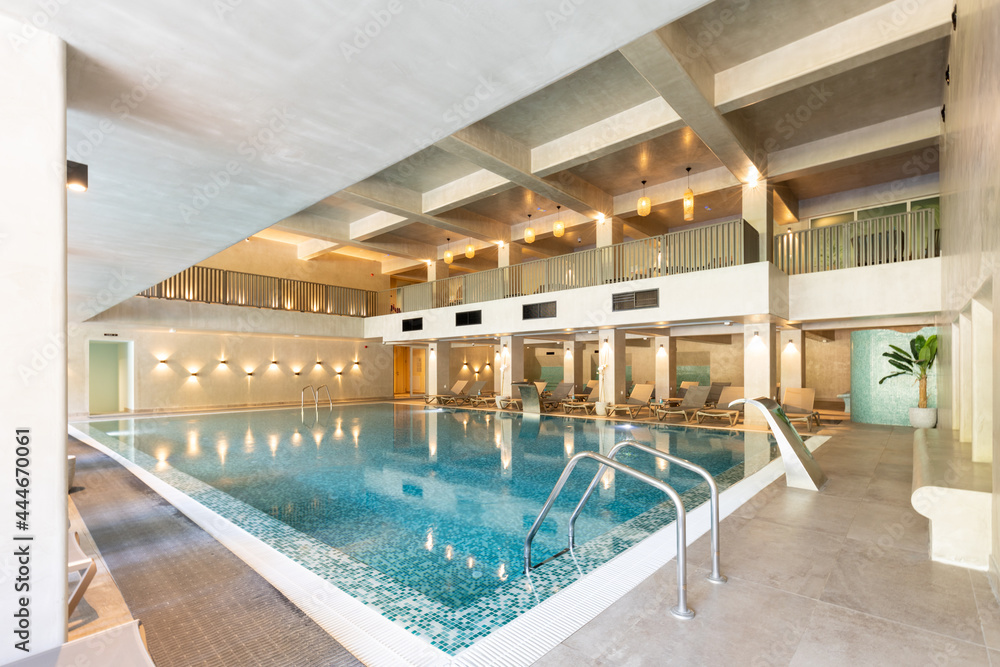 Indoor swimming pool in hotel wellness center - obrazy, fototapety, plakaty 