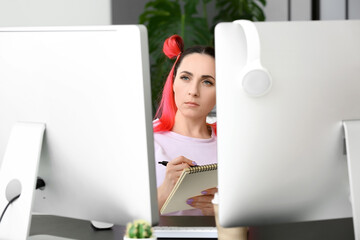 Wall Mural - Female programmer working in office